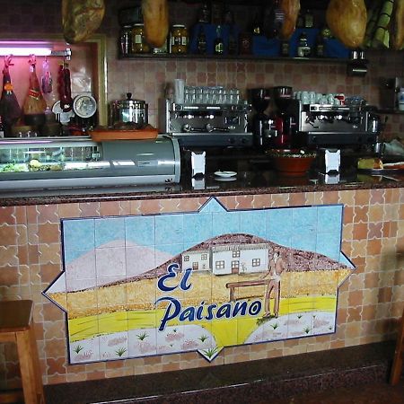Hostal-Restaurante El Paisano Guadalema de los Quinteros Extérieur photo