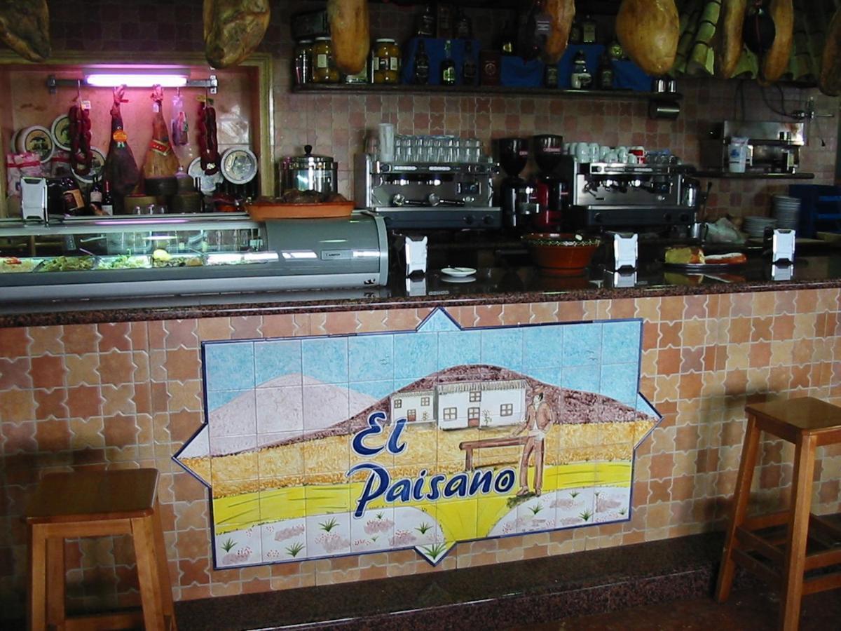 Hostal-Restaurante El Paisano Guadalema de los Quinteros Extérieur photo